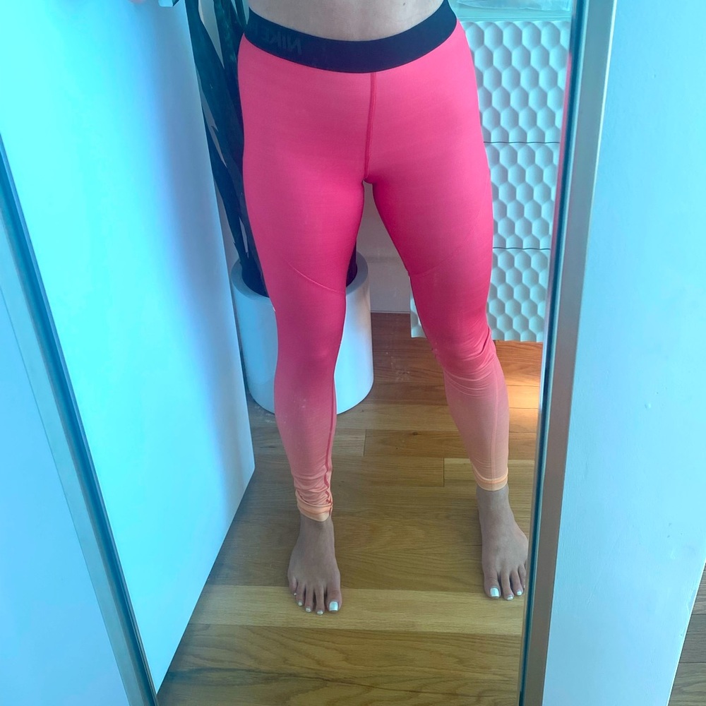 Nike womens performance leggings. Hot pink to orange ombré. Size small.